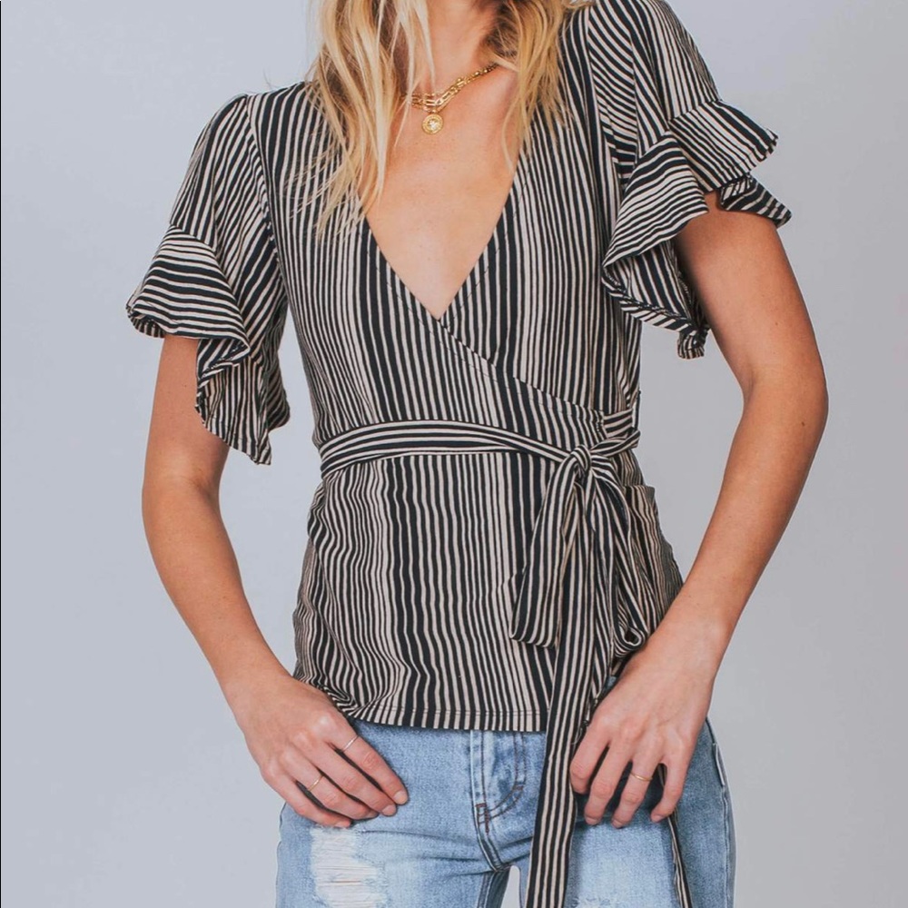 Free People “wrapped around my finger” top  sz L